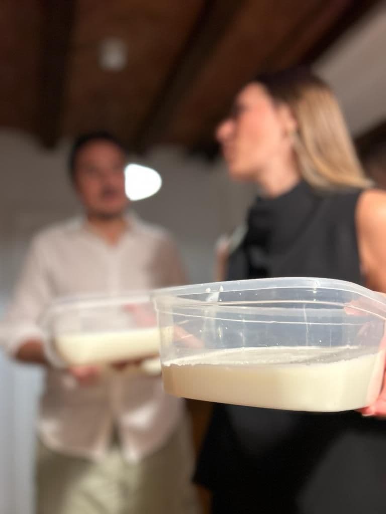 Participants holding their freshly made cheese