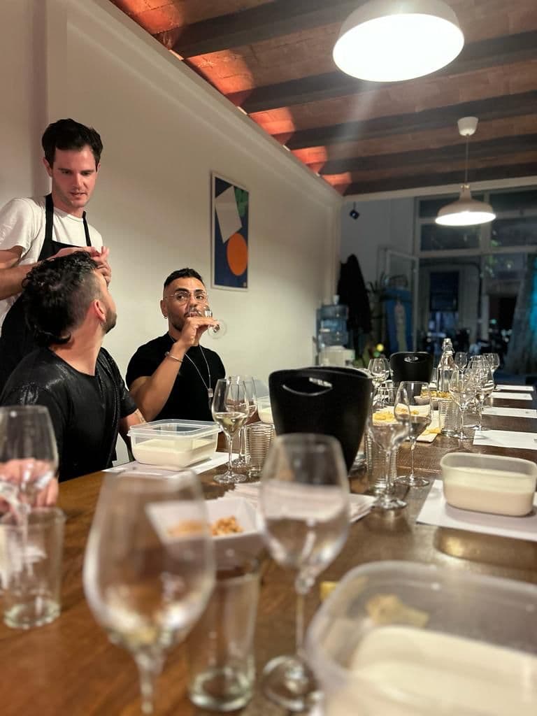 The tasting table — wine glasses and cheese laid out